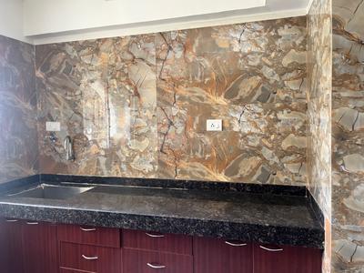 Kitchen Image of 1250 Sq.ft 3 BHK Apartment / Flat for sale in Tharwani Vedant Nakshatra, Badlapur West Badlapur for Rs. 7400000