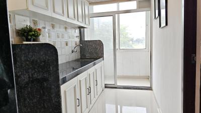 Kitchen Image of 678 Sq.ft 1 BHK Apartment / Flat for sale in SPS White Falcon, Pushpak Nagar Navi Mumbai for Rs. 3800000