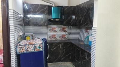 Kitchen Image of 1100 Sq.ft 3 BHK Builder Floor for rent in Ramesh Nagar New Delhi for Rs. 38000