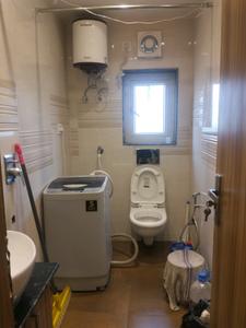 Common Bathroom Image of 370 Sq.ft 1 RK Apartment / Flat for sale in DLF Capital Greens, Karampura New Delhi for Rs. 4800000