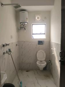 Common Bathroom Image of 367 Sq.ft 1 RK Apartment / Flat for rent in DLF Capital Greens Phase 1 And 2, Karampura New Delhi for Rs. 25500