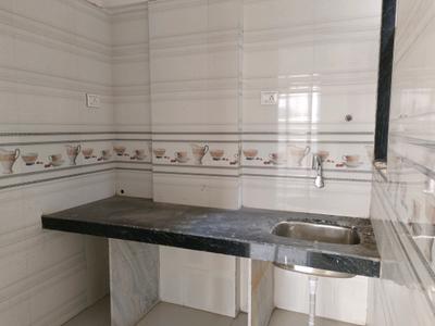 Kitchen Image of 695 Sq.ft 1 BHK Apartment / Flat for sale in Surmanj Residency, Ulwe Navi Mumbai for Rs. 4000000