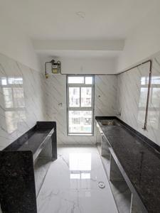 Kitchen Image of 600 Sq.ft 1 BHK Apartment / Flat for sale in Parinee Essence, Kandivali West Mumbai for Rs. 8900000