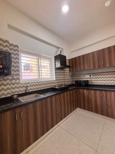 Kitchen Image of 650 Sq.ft 1 BHK Apartment / Flat for rent in Domlur Layout Bengaluru for Rs. 55000