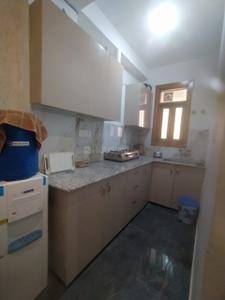 Kitchen Image of 1150 Sq.ft 3 BHK Apartment / Flat for rent in Rajpur Khurd Extension New Delhi for Rs. 23000