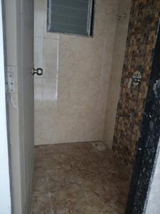 Common Bathroom Image of 690 Sq.ft 1 BHK Apartment / Flat for sale in Pushpak Nagar Navi Mumbai for Rs. 4425000