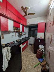 Kitchen Image of 940 Sq.ft 2 BHK Apartment / Flat for rent in Deepam CHS, Kopar Khairane Navi Mumbai for Rs. 43000