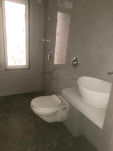 Common Bathroom Image of 672 Sq.ft 2 BHK Apartment / Flat for sale in Digam Poonam CHSL, Borivali East Mumbai for Rs. 17900000