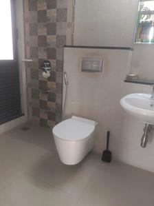 Common Bathroom Image of 750 Sq.ft 2 BHK Apartment / Flat for sale in Mahindra Roots, Kandivali East Mumbai for Rs. 18000000