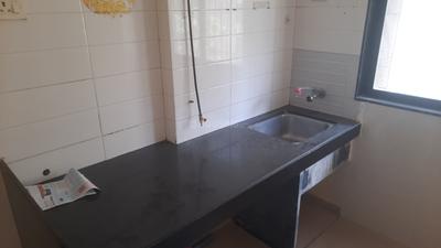Kitchen Image of 590 Sq.ft 1 BHK Apartment / Flat for sale in Raunak Unnathi Greens, Kasarvadavali Thane for Rs. 5500000