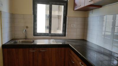 Kitchen Image of 870 Sq.ft 2 BHK Apartment / Flat for rent in Unimark Lakewood Estate, New Garia Kolkata for Rs. 28000