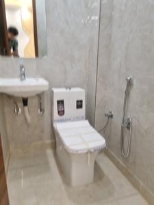 Common Bathroom Image of 550 Sq.ft 2 BHK Apartment / Flat for sale in Dwarka Mor New Delhi for Rs. 3600000