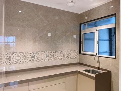 Kitchen Image of 1050 Sq.ft 2 BHK Apartment / Flat for sale in Swaminarayan City, Dombivli West Thane for Rs. 6800000