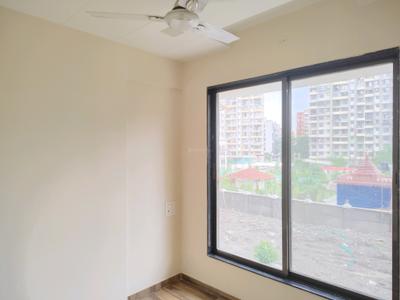 Bedroom Image of 740 Sq.ft 1 BHK Apartment / Flat for rent in Unnati Woods Phase 7, Kasarvadavali Thane for Rs. 16500