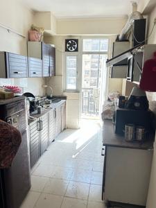 Kitchen Image of 1324 Sq.ft 3 BHK Apartment / Flat for sale in Amrapali Zodiac, Sector 120 Noida for Rs. 12500000