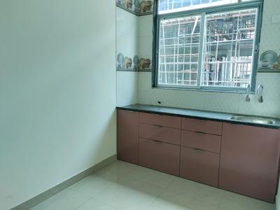 Kitchen Image of 800 Sq.ft 2 BHK Apartment / Flat for sale in Sai Shrushti Shiv Sarovar Heritage, Khidkali Thane for Rs. 5700000