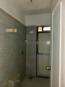 Common Bathroom Image of 740 Sq.ft 2 BHK Apartment / Flat for sale in Cosmos Meluha, Khidkali Thane for Rs. 6800000