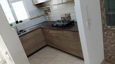 Kitchen Image of 1075 Sq.ft 2 BHK Apartment / Flat for rent in Gaur City 7th Avenue, Noida Extension Greater Noida for Rs. 23500