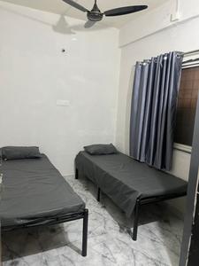 Bedroom Image of mauraya PG hostel in Loni Kalbhor, Pune