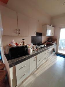 Kitchen Image of 1359 Sq.ft 3 BHK Apartment / Flat for sale in Paramount Floraville, Sector 137 Noida for Rs. 16300000