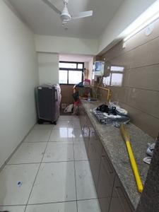 Kitchen Image of 600 Sq.ft 2 BHK Apartment / Flat for rent in Orchid Blues, Shela Ahmedabad for Rs. 35000