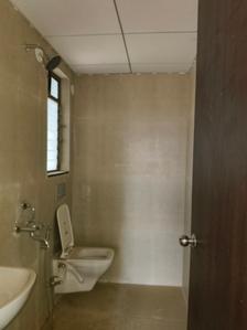 Common Bathroom Image of 790 Sq.ft 2 BHK Apartment / Flat for sale in Runwal My City Phase II Cluster 05 Part I, Usarghar Thane for Rs. 6500000