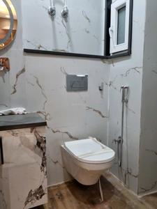 Common Bathroom Image of 600 Sq.ft 2 BHK Apartment / Flat for sale in Dwarka Mor New Delhi for Rs. 3200000