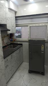 Kitchen Image of 367 Sq.ft 1 RK Studio for rent in DLF Capital Greens, Karampura New Delhi for Rs. 23000