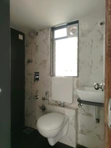 Common Bathroom Image of 699 Sq.ft 2 BHK Apartment / Flat for sale in Mansarovar Ariana, Vasai West Vasai for Rs. 5180000