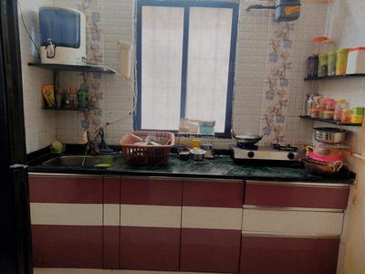 Kitchen Image of 1290 Sq.ft 2 BHK Apartment / Flat for rent in Pramukh Residency, Chala Vapi for Rs. 13000