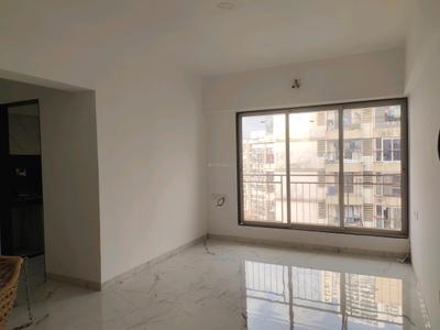 Living Room Image of 525 Sq.ft 1 BHK Apartment / Flat for sale in Dharti Pressidio, Kandivali West Mumbai for Rs. 9300000