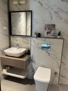Bathroom Image of 1610 Sq.ft 3 BHK Apartment / Flat for sale in Sah Santiago Skyland, Kiwale Pune for Rs. 7242425