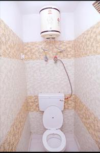 Bathroom Image of 900 Sq.ft 2 BHK Apartment / Flat for rent in Rajpur Khurd Extension New Delhi for Rs. 23000