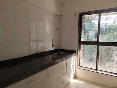 Kitchen Image of 650 Sq.ft 1 BHK Apartment / Flat for sale in Sangam Emporio Towers, Malad West Mumbai for Rs. 9500000