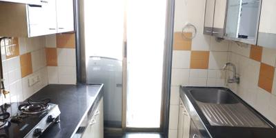 Kitchen Image of 1120 Sq.ft 2 BHK Apartment / Flat for rent in Patel Aum Sai, Kharghar Navi Mumbai for Rs. 51000