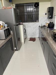 Kitchen Image of 1000 Sq.ft 2 BHK Apartment / Flat for rent in Kumar Park Infinia B1 And B2, Fursungi Pune for Rs. 25000