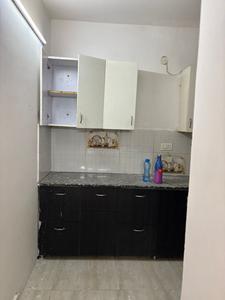 Kitchen Image of 600 Sq.ft 1 BHK Builder Floor for rent in Dwarka Mor New Delhi for Rs. 10000