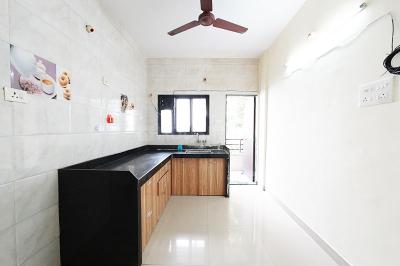 Kitchen Image of 940 Sq.ft 2 BHK Apartment / Flat for sale in Wakad Pune for Rs. 7500000