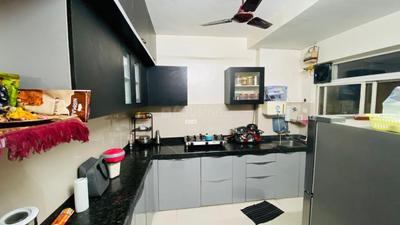 Kitchen Image of 1000 Sq.ft 2 BHK Apartment / Flat for rent in Bramha Skycity, Dhanori Pune for Rs. 35000