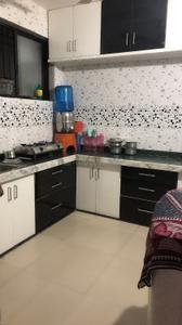 Kitchen Image of 960 Sq.ft 2 BHK Apartment / Flat for sale in M B Complex, Balakhadi Pardi for Rs. 2200000