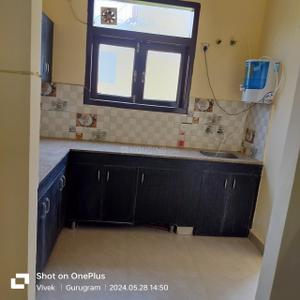 Kitchen Image of 650 Sq.ft 1.5 BHK Builder Floor for rent in Sector 52A Gurgaon for Rs. 21000