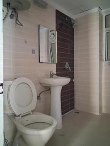 Common Bathroom Image of 1075 Sq.ft 2.5 BHK Apartment / Flat for sale in Amrapali Zodiac, Sector 120 Noida for Rs. 10300000
