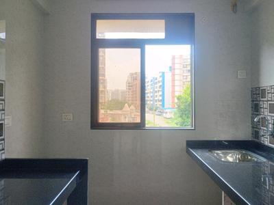 Kitchen Image of 674 Sq.ft 1 BHK Apartment / Flat for sale in Raj Urbania, Ambernath East Ambernath for Rs. 2600000