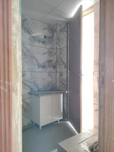 Common Bathroom Image of 1095 Sq.ft 2 BHK Apartment / Flat for sale in Devla Greater Noida for Rs. 3758182