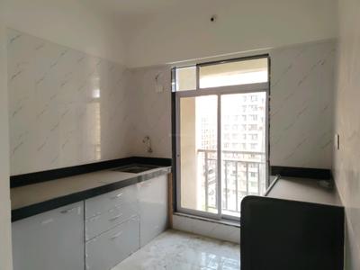 Kitchen Image of 705 Sq.ft 1 BHK Apartment / Flat for sale in Munish Emonics Tower, Vasai East Vasai for Rs. 3877000