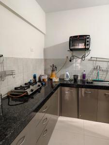 Kitchen Image of 783 Sq.ft 2 BHK Apartment / Flat for rent in Shapoorji Pallonji Joyville Sensorium, Maan Pune for Rs. 36000