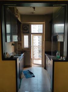 Kitchen Image of 935 Sq.ft 2 BHK Apartment / Flat for rent in Arihant Arden, Noida Extension Greater Noida for Rs. 19000