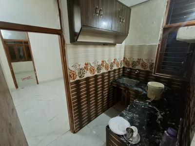 Kitchen Image of 585 Sq.ft 2 BHK Builder Floor for rent in Khirki Extension New Delhi for Rs. 14000