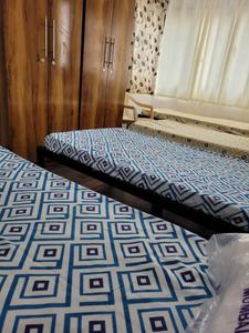 Bedroom Image of Ashwini p g in Koregaon Park, Pune