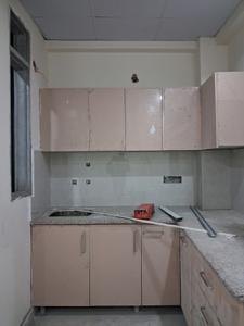 Kitchen Image of 980 Sq.ft 2 BHK Apartment / Flat for sale in GCM Gomati Apartment, Sector 49 Noida for Rs. 3900000